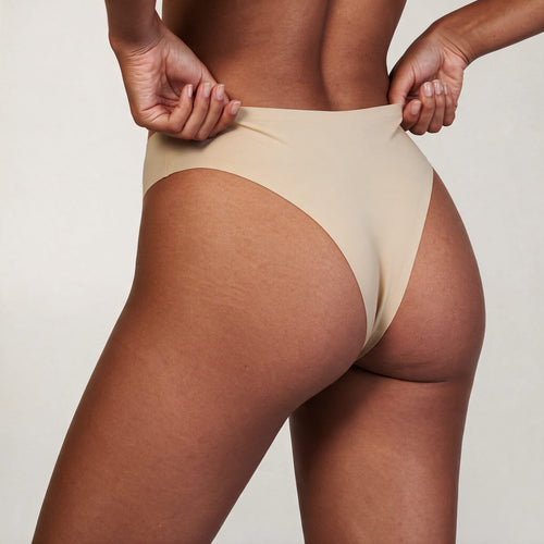 Essencial | Tanga — costas