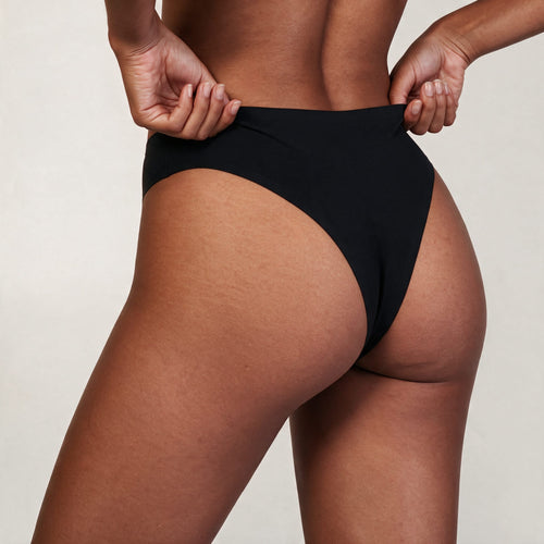 Essencial | Tanga — costas